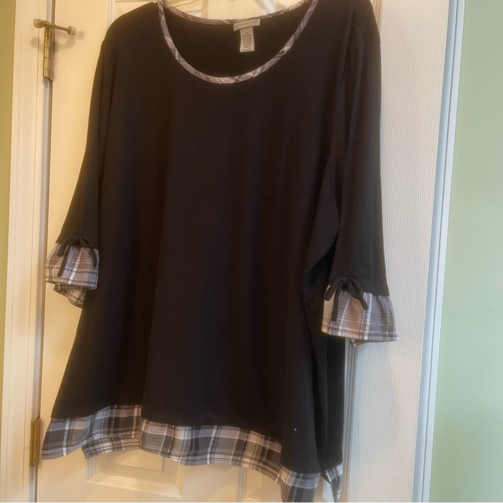 Catherines Black Blouse with Plaid Trim.  (85)